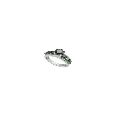 Gouden ring met groene diamanten